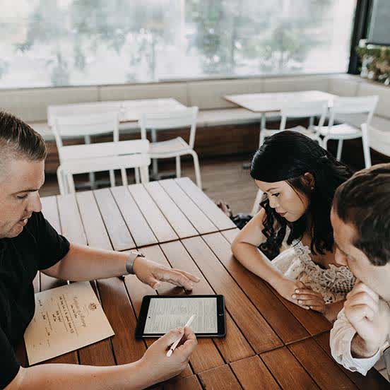 Couple reviewing legal marriage paperwork